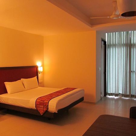 Ixora Suites Bangalore Quarto foto