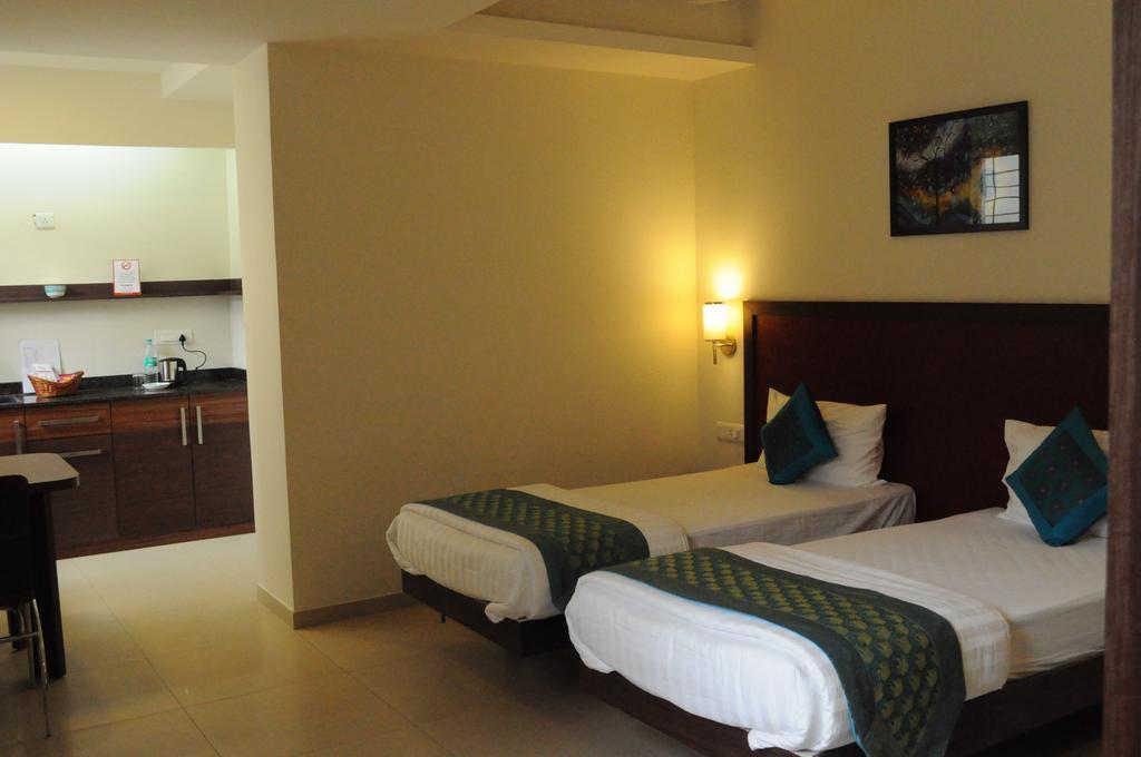 Ixora Suites Bangalore Quarto foto